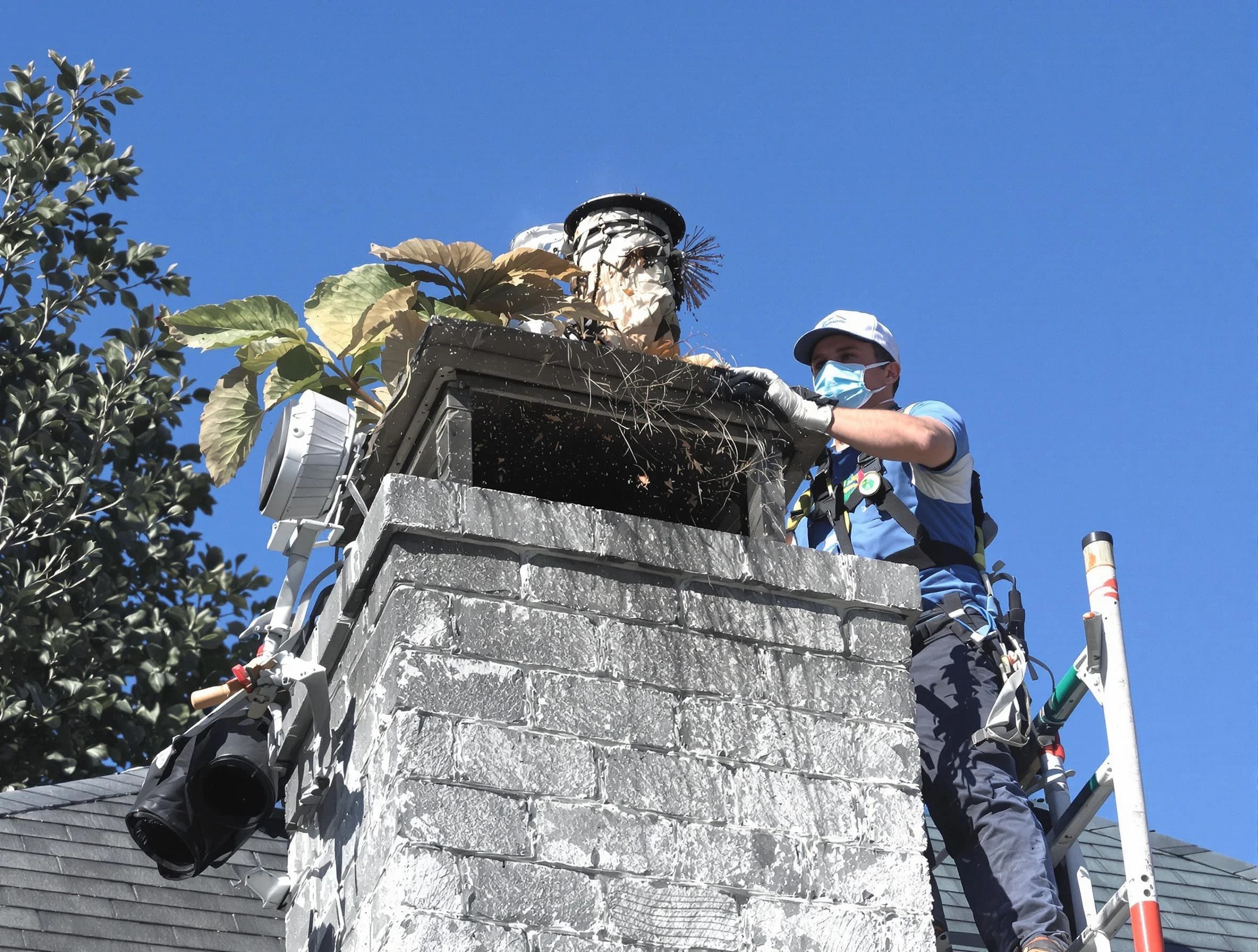 Princeton Chimney Sweep specialist performing chimney cleaning in Princeton, NJ